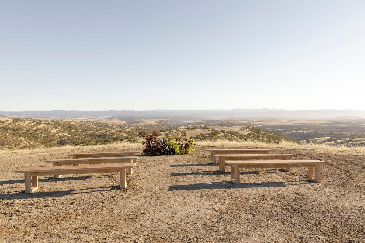 Ceremony benches on the ridge with the valley beyond